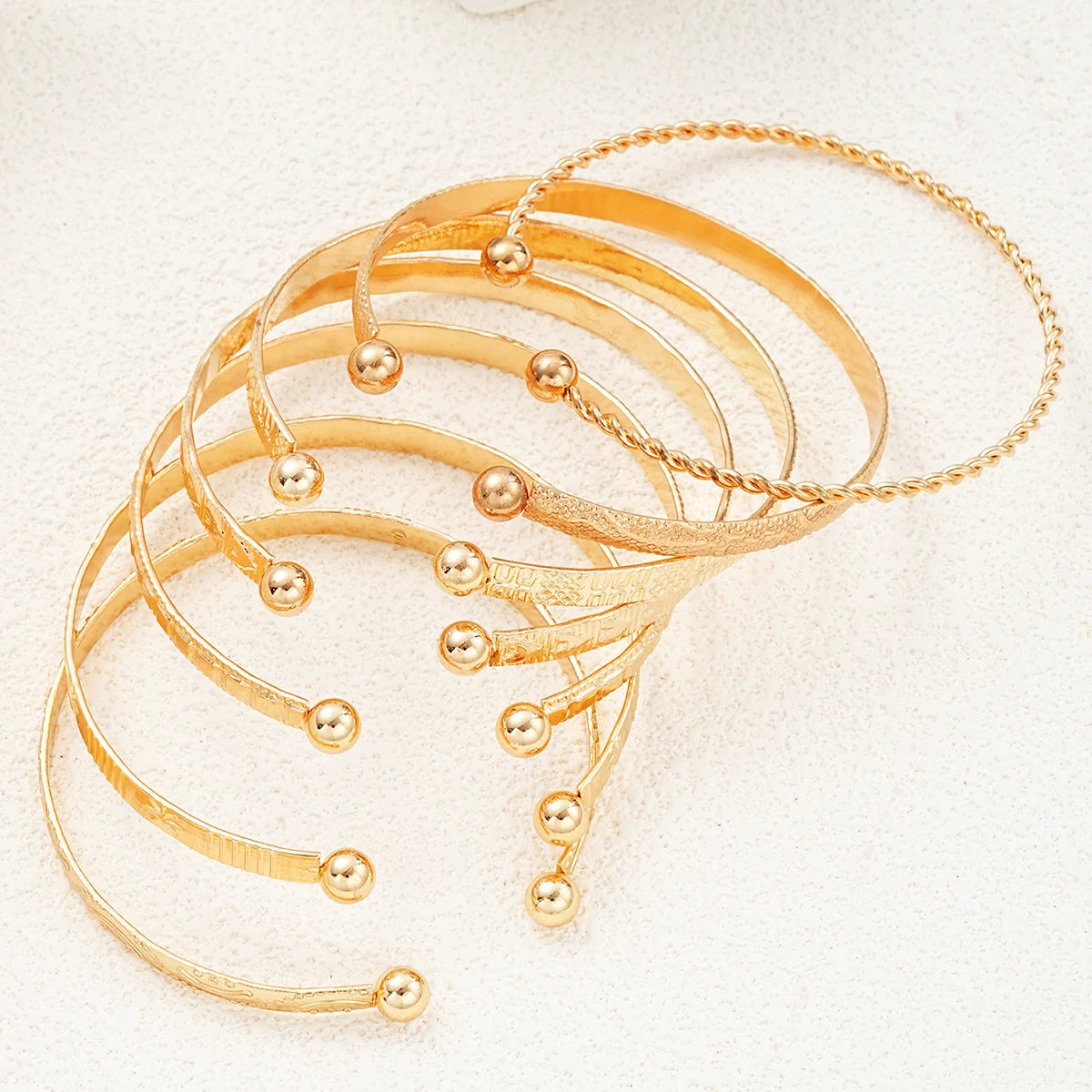 Set 7 Bracelets Dorés – Style Punk Chic & Géométrique